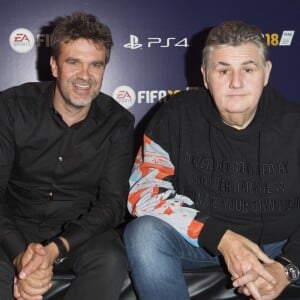 Hervé Mathoux et Pierre Ménès - Lancement du jeu vidéo de football FIFA 18 (FIFA 2018) à l'établissement public de coopération culturelle parisien "CentQuatre" à Paris, le 25 septembre 2017. © Pierre Perusseau/Bestimage