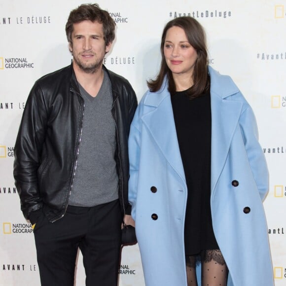 Marion Cotillard enceinte et son compagnon Guillaume Canet - Avant première du documentaire "Before the flood" au théâtre du Chatelet à Paris le 17 octobre 2016.