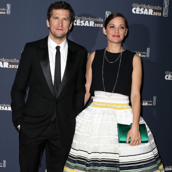 Guillaume Canet et Marion Cotillard - Photocall de la 40ème cérémonie des César au théâtre du Châtelet à Paris. Le 20 février 2015.
