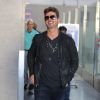 Robin Thicke arrive à l'aéroport de LAX à Los Angeles, le 15 octobre 2017.  Singer Robin Thicke was spotted smiling as he strolled to baggage claim after touching down at LAX in Los Angeles. 15th october 2017.15/10/2017 - Los Angeles