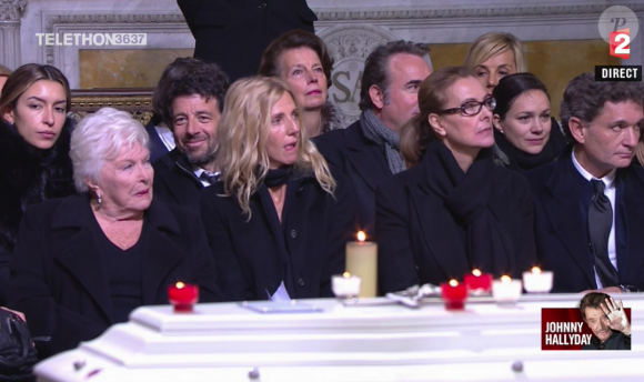 Line Renaud, Sandrine Kiberlain aux obsèques de Johnny Hallyday à Paris. Le 9 décembre 2017.
