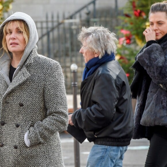 Emmanuelle Seigner et Roman Polanski avec leur fille Morgane à l'église de la Madeleine aux obsèques de Johnny Hallyday à Paris, le 9 décembre 2017. © Coadic Guirec/Bestimage