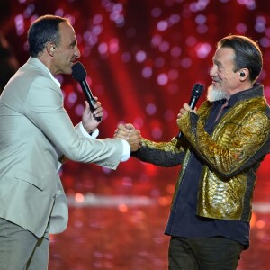 Exclusif - Nikos Aliagas et Florent Pagny - Emission "La chanson de l'année fête la musique" dans les arènes de Nîmes, diffusée en direct sur TF1 le 17 juin 2017. Pour la treizième édition de La Chanson de L'année, c'est l'artiste Amir avec son titre "On dirait" qui a été plébiscité par les votes du public. © Bruno Bebert/Bestimage