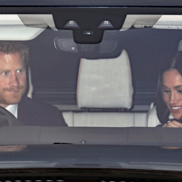Le prince Harry et Meghan Markle au palais de Buckingham pour le traditionnel déjeuner de Noël organisé par la reine Elizabeth II, le 20 décembre 2017 à Londres.