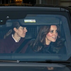 Le prince William et la duchesse Catherine de Cambridge avec leurs enfants George et Charlotte ainsi que la nourrice Maria Teresa Turrion Borrallo au palais de Buckingham pour le traditionnel déjeuner de Noël organisé par la reine Elizabeth II, le 20 décembre 2017 à Londres.