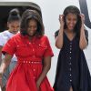La première dame des Etats-Unis Michelle Obama, ses filles Malia et Sasha et sa mère Marian Robinson à leur accueil par Luigi Brugnaro et Luca Zaia lors de leur arrivée en avion à l'aéroport de Venise, le 19 juin 2015. 