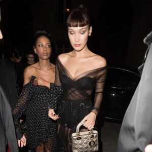 Bella Hadid et Fanny Bourdette-Donon à la sortie de la soirée "Le Bal Surréaliste" Dior au Musée Rodin lors de la Fashion Week à Paris le 22 janvier 2018.