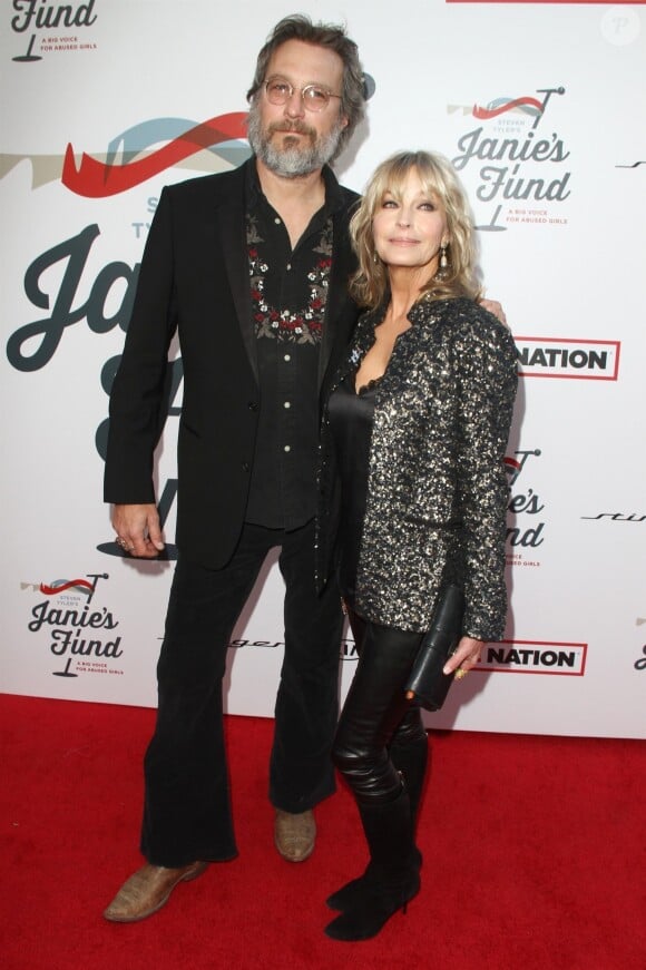 Bo Derek et son compagnon John Corbett à la soirée caritative Janie's Fund and Grammy Awards Viewing à Hollywood, le 28 janvier 2018