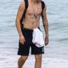 Brooklyn Beckham a profité de la plage avec son garde du corps à Miami, le 29 janvier 2018