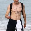 Brooklyn Beckham a profité de la plage avec son garde du corps à Miami, le 29 janvier 2018