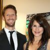 Romain Grosjean et son épouse Marion Jollès-Grosjean (enceinte) posent pour la promotion de leur livre de recettes de cuisine "Cuisine et Confidences", disponible en anglais.