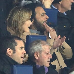 Maxim Nucci et sa compagne Isabelle Ithurburu, enceinte, assistent à l'élimination du PSG en huitièmes de finale retour de Ligue des Champion contre le Real Madrid au Parc des Princes à Paris le 6 mars 2018. © Cyril Moreau/Bestimage