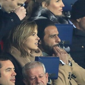 Maxim Nucci et sa compagne Isabelle Ithurburu, enceinte, assistent à l'élimination du PSG en huitièmes de finale retour de Ligue des Champion contre le Real Madrid au Parc des Princes à Paris le 6 mars 2018. © Cyril Moreau/Bestimage