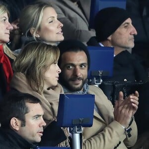 Maxim Nucci et sa compagne Isabelle Ithurburu, enceinte, assistent à l'élimination du PSG en huitièmes de finale retour de Ligue des Champion contre le Real Madrid au Parc des Princes à Paris le 6 mars 2018. © Cyril Moreau/Bestimage