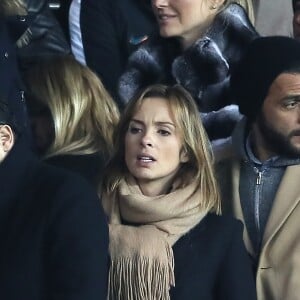 Maxim Nucci et sa compagne Isabelle Ithurburu, enceinte, assistent à l'élimination du PSG en huitièmes de finale retour de Ligue des Champion contre le Real Madrid au Parc des Princes à Paris le 6 mars 2018. © Cyril Moreau/Bestimage