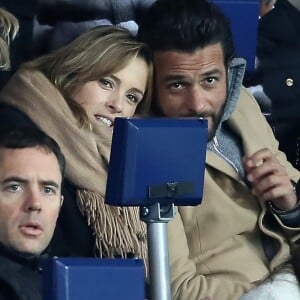 Maxim Nucci et sa compagne Isabelle Ithurburu, enceinte, assistent à l'élimination du PSG en huitièmes de finale retour de Ligue des Champion contre le Real Madrid au Parc des Princes à Paris le 6 mars 2018. © Cyril Moreau/Bestimage