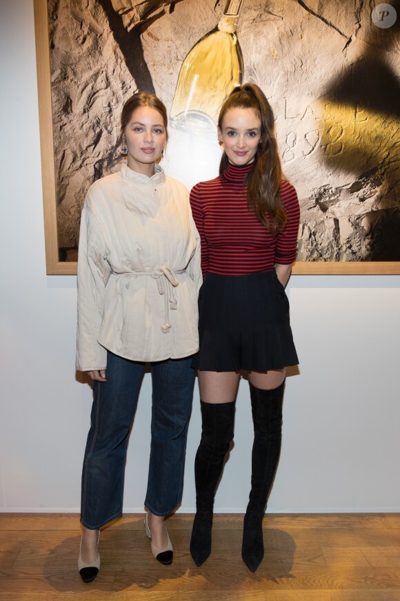 Marie-Ange Casta et Charlotte Le Bon - Vernissage de l'artiste chinois Liu Bolin avec la maison Ruinart au Grand Palais à Paris le 8 mars 2018. © Cyril Moreau/Bestimage