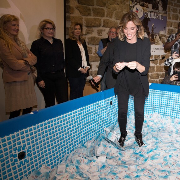 Isabelle Ithurburu - Tirage national du Don'actions du Secours Populaire à Paris, le 16 mars 2018.