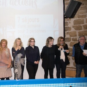 Régine Teyssot, Dominique Dimey, Christiane Jean, Véronica Antonelli, Isabelle Ithurburu, Valérie Trierweiler, Christian Rauth - Tirage national du Don'actions du Secours Populaire à Paris, le 16 mars 2018.