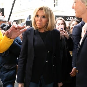 Yann Bucaille Lanrezac, la première dame Brigitte Macron, Sophie Cluzel, secrétaire d'État chargée des Personnes handicapées lors de la visite du restaurant "Joyeux, servi avec le coeur" à Paris tenu par 25 serveurs et cuisiniers en situation de handicap mental ou cognitif le 21 mars 2018 qui est aussi la journée mondiale de la trisomie 21. © Sébastien Valiela / Bestimage