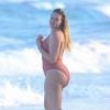 Exclusif - Iskra Lawrence s'amuse dans les vagues, passe du bon temps entre amis et pose aussi pour AerieREAL sur une plage de Tulum au Mexique, le 22 février 2018  For germany call for price Exclusive - Model Iskra Lawrence hit the beach in a sexy beige one piece in Tulum, Mexico, this week. The 27-year-old English stunner put her curves on display while taking a dip in the ocean and hanging in the water with friends. Iskra also pose for a new AerieREAL campaign. Iskra uses a shell as a prop as she "makes a call" - 22nd february 201822/02/2018 - Tulum
