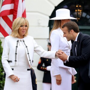 La Première Dame américaine Melania Trump, le président de la République française Emmanuel Macron et sa femme la Première Dame Brigitte Macron (Trogneux) - Le couple présidentiel américain accueille le couple présidentiel français à la Maison Blanche à Washington, le 24 avril 2018. © Dominique Jacovides/Bestimage