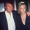 David Hallyday entouré de ses parents, Johnny Hallyday et Sylvie Vartan, le soir de sa première le 9 mars 1991 à Paris.
