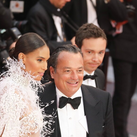 Cindy Bruna (robe Ashi) (bijoux De Grisogono) et Gilles Mansard (Président de De Grisogono France) - Montée des marches du film " Burning " lors du 71ème Festival International du Film de Cannes. Le 16 mai 2018 © Borde-Jacovides-Moreau/Bestimage