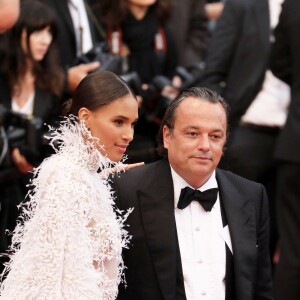 Cindy Bruna (robe Ashi) (bijoux De Grisogono) et Gilles Mansard (Président de De Grisogono France) - Montée des marches du film " Burning " lors du 71ème Festival International du Film de Cannes. Le 16 mai 2018 © Borde-Jacovides-Moreau/Bestimage