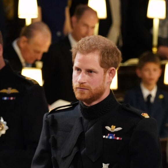 Le prince Harry et Meghan Markle (en robe de mariée Givenchy), duc et duchesse de Sussex, mari et femme à la sortie de chapelle St. George au château de Windsor après leur mariage le 19 mai 2018.