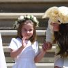 La princesse Charlotte de Cambridge, qui était avec sa mère la duchesse Catherine et tenait le rôle de flowergirl au mariage du prince Harry et de Meghan Markle, duc et duchesse de Sussex, le 19 mai 2018 à Windsor, a fait sensation ! Mignonne et facétieuse, le public a craqué...