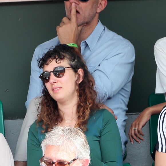 Exclusif - Vincent Cassel et sa compagne Tina Kunakey dans les tribunes des internationaux de Roland Garros - jour 5 - à Paris, France, le 31 mai 2018. © Cyril Moreau - Dominique Jacovides/Bestimage