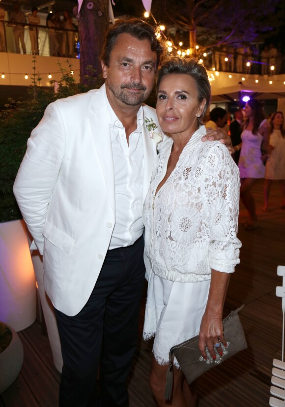 Henri Leconte et sa compagne Maria Dowlatshahi lors du dîner de la "Soirée Blanche" au bar Magnum du Village de Roland Garros à Paris, le 7 juin 2018. © Veeren/Bestimage
