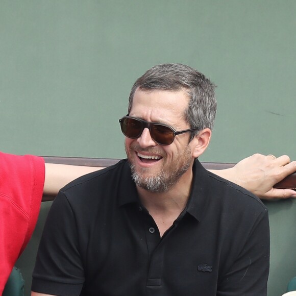 Marion Cotillard et son compagnon Guillaume Canet dans les tribunes des Internationaux de France de Tennis de Roland Garros à Paris, le 10 juin 2018. © Jacovides/Moreau/Bestimage