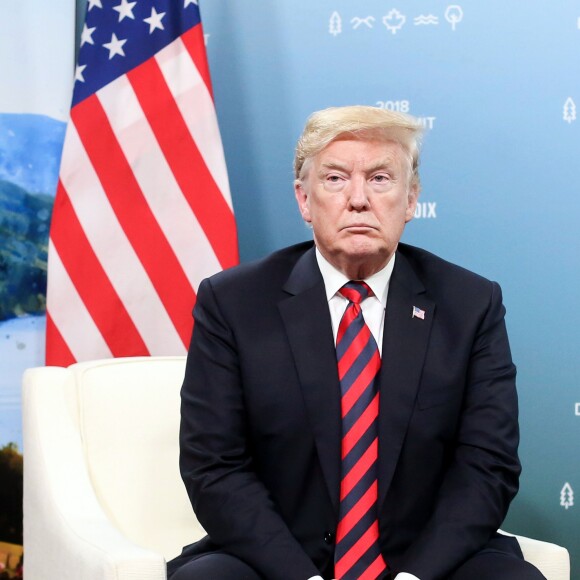 Emmanuel Macron, président de la République Française, et le président des Etats-Unis Donald J. Trump lors d'un entretien bilatéral dans le cadre du sommet du G7 au manoir Richelieu à La Malbaie. Canada, le 8 juin 2018. © Stéphane Lemouton/Bestimage