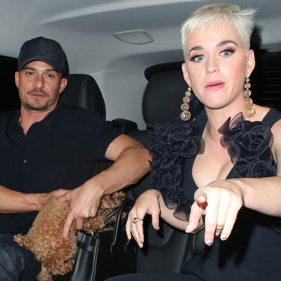 Orlando Bloom et sa compagne Katy Perry arrivent ensemble et main dans la main au "Chiltern Firehouse" à Londres le 16 juin 2018.