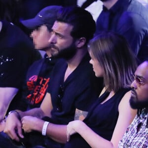 Maxim Nucci (Yodelice) et sa compagne enceinte Isabelle Ithurburu - Maxim Nucci (Yodelice) et sa compagne enceinte Isabelle Ithurburu assistent au match de boxe de Tony Yoka au palais des sports de Paris, le 23 juin 2018 © Veeren-CVS/Bestimage