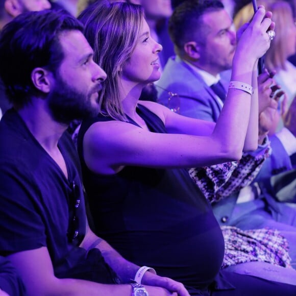 Maxim Nucci (Yodelice) et sa compagne enceinte Isabelle Ithurburu - Maxim Nucci (Yodelice) et sa compagne enceinte Isabelle Ithurburu assistent au match de boxe de Tony Yoka au palais des sports de Paris, le 23 juin 2018 © Veeren-CVS/Bestimage