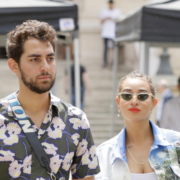 Camélia Jordana et un ami au défilé de mode Balmain homme collection printemps-été 2019 lors de la fashion week à Paris le 24 juin 2018 © Veeren/CVS/Bestimage