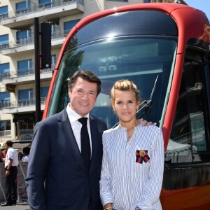 Exclusif - Christian Estrosi et sa femme Laura Tenoudji durant l'inauguration de la ligne 2 Ouest Est du tramway sur le tronçon aérien entre le CADAM et Magnan à Nice 30 juin 2018. Ce tramway est le premier au monde à utiliser un système innovant de recharge ponctuelle en station permettant une autonomie totale entre les stations aèriennes. Le SRS est un système de recharge statique par le sol mis au point par Alstom. Un tramway plus propre, plus performant avec un design signé par le niçois Ora Ito. Cet été, de 7h à 21h et jusqu'au 2 septembre les 7kms mis en service seront gratuits pour les usagers, d'ici septembre 2019 la partie souterraine sera terminée et les passagers pourront rejoindre l'aéroport en partant du port en 26 minutes.30/06/2018 - Nice