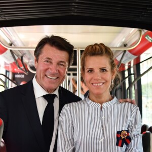 Exclusif - Christian Estrosi et sa femme Laura Tenoudji durant l'inauguration de la ligne 2 Ouest Est du tramway sur le tronçon aérien entre le CADAM et Magnan à Nice 30 juin 2018. Ce tramway est le premier au monde à utiliser un système innovant de recharge ponctuelle en station permettant une autonomie totale entre les stations aèriennes. Le SRS est un système de recharge statique par le sol mis au point par Alstom. Un tramway plus propre, plus performant avec un design signé par le niçois Ora Ito. Cet été, de 7h à 21h et jusqu'au 2 septembre les 7kms mis en service seront gratuits pour les usagers, d'ici septembre 2019 la partie souterraine sera terminée et les passagers pourront rejoindre l'aéroport en partant du port en 26 minutes.30/06/2018 - Nice