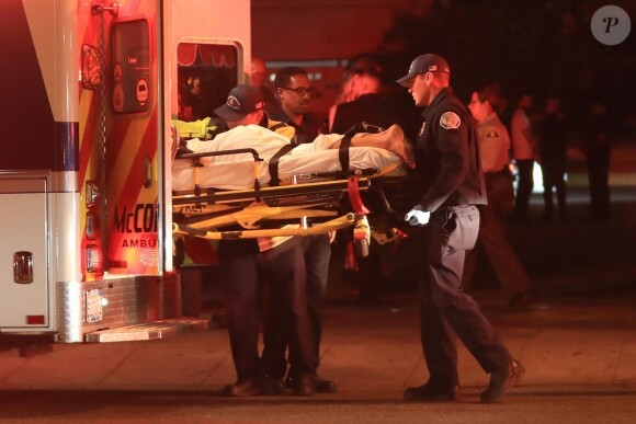 L'instagrammeuse australienne Tammy Hembrow quitte la soirée d'anniversaire de Kylie Jenner au Delillah, sur un brancard escortée par des ambulanciers. West Hollywood, 10 août 2018.