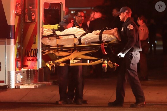 L'instagrammeuse australienne Tammy Hembrow quitte la soirée d'anniversaire de Kylie Jenner au Delillah, sur un brancard escortée par des ambulanciers. West Hollywood, 10 août 2018.