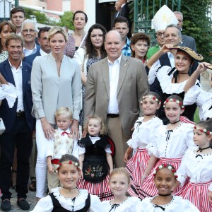 Gareth Wittstock et Sean Wittstock (frères de la Princesse Charlène de Monaco), Jean Leonard de Massy, la princesse Charlène de Monaco avec le prince Jacques de Monaco, Mélanie de Massy, le prince Albert II de Monaco avec la princesse Gabriella de Monaco, la baronne Elisabeth Ann de Massy, Monseigneur Barsi, Georges Marsan (Maire de Monaco) - Traditionnel Pique-nique des Monégasques dans les jardins du parc Princesse Antoinette à Monaco, le 31 août 2018. La famille a assisté à une danse folklorique animée par le groupe "La Paladienne". © Jean-Charles Vinaj / PRM / Bestimage