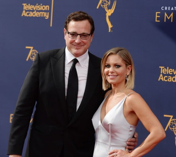 Bob Saget et Candace Cameron-Bure aux Primetime Creative Arts Emmy Awards au Microsoft Theater à Los Angeles, le 9 septembre 2018.