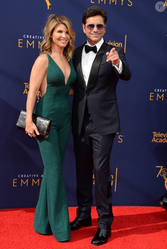 Lori Loughlin et John Stamos aux Primetime Creative Arts Emmy Awards au Microsoft Theater à Los Angeles, le 9 septembre 2018.