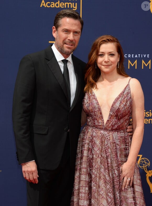 Alexis Denisof et sa femme Alyson Hannigan aux Primetime Creative Arts Emmy Awards au Microsoft Theater à Los Angeles, le 9 septembre 2018.