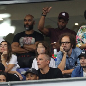 Élodie Bouchez, son mari Thomas Bangalter (groupe Daft Punk), leur fils Roxan et Tara-Jay, Sylvain Wiltord, Alicia Aylies (Miss France 2017), François Civil et Joséphine Japy dans les tribunes lors de la Ligue des nations opposant la France aux Pays-Bas, au Stade de France, à Saint-Denis, Seine Saint-Denis, France, le 9 septembre 2018. La France a gagné 2-1. © Cyril Moreau/Bestimage