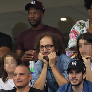 Élodie Bouchez, son mari Thomas Bangalter (groupe Daft Punk), leur fils Roxan et Tara-Jay, Sylvain Wiltord et François Civil dans les tribunes lors de la Ligue des nations opposant la France aux Pays-Bas, au Stade de France, à Saint-Denis, Seine Saint-Denis, France, le 9 septembre 2018. La France a gagné 2-1. © Cyril Moreau/Bestimage