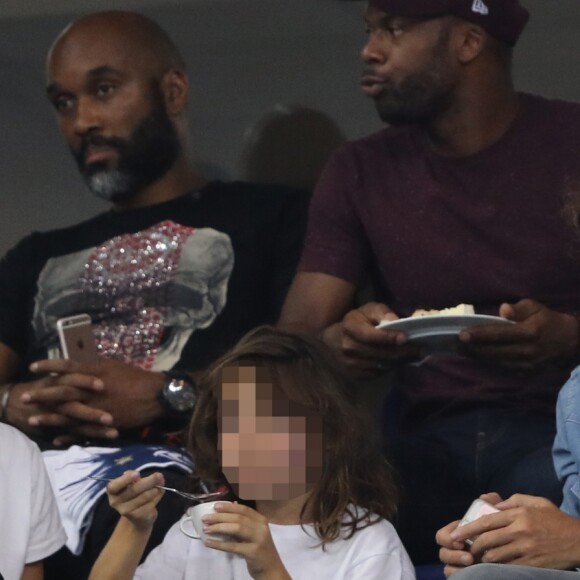 Sylvain Wiltord, Élodie Bouchez, son mari Thomas Bangalter (groupe Daft Punk), leur fils Roxan et Tara-Jay dans les tribunes lors de la Ligue des nations opposant la France aux Pays-Bas, au Stade de France, à Saint-Denis, Seine Saint-Denis, France, le 9 septembre 2018. La France a gagné 2-1. © Cyril Moreau/Bestimage